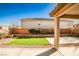 Artificial turf, covered patio, and a spacious backyard at 766 Topocoba St, Las Vegas, NV 89178