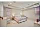 Bright bedroom featuring a comfortable bed and ample space at 766 Topocoba St, Las Vegas, NV 89178