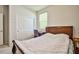 Bedroom with double bed, closet, and window coverings at 766 Topocoba St, Las Vegas, NV 89178