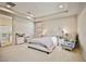Spacious bedroom with a queen bed and en-suite bathroom access at 766 Topocoba St, Las Vegas, NV 89178