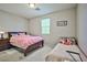 Bedroom with a queen bed and a twin bed at 766 Topocoba St, Las Vegas, NV 89178