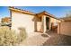 View of the front entry with a decorative gate at 766 Topocoba St, Las Vegas, NV 89178