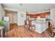 Kitchen with island, stainless steel appliances, and wood cabinets at 766 Topocoba St, Las Vegas, NV 89178