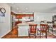 Kitchen boasts an island, granite countertops, and stainless steel appliances at 766 Topocoba St, Las Vegas, NV 89178