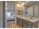 Double vanity bathroom with view into bedroom at 92 Stone Bluff Ln, Henderson, NV 89011