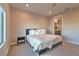 Bright bedroom with a queen-size bed and access to a private bathroom at 92 Stone Bluff Ln, Henderson, NV 89011