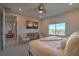 Bright bedroom with window views and cozy bed at 92 Stone Bluff Ln, Henderson, NV 89011