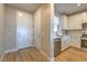 Bright entryway with light wood flooring and white door at 92 Stone Bluff Ln, Henderson, NV 89011