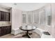 Breakfast nook with built-in bench seating in kitchen at 9463 Belmont Bay Ave, Las Vegas, NV 89148