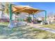 Community playground with shaded seating area at 9463 Belmont Bay Ave, Las Vegas, NV 89148