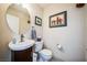 Clean bathroom with white vanity and round mirror at 11193 Falesco Ave, Las Vegas, NV 89138