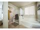 Main bathroom with soaking tub and shower at 11193 Falesco Ave, Las Vegas, NV 89138