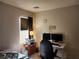 Bedroom with a desk, chair, and two monitors at 11193 Falesco Ave, Las Vegas, NV 89138