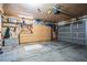 Garage with storage cabinets and overhead storage at 11193 Falesco Ave, Las Vegas, NV 89138