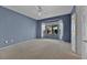 Spacious bedroom with blue walls and bay window at 1647 Fieldbrook St, Henderson, NV 89052