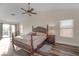 Spacious main bedroom with a large bed and ceiling fan at 179 Andada Dr, Henderson, NV 89012