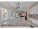 Kitchen island with granite countertop, overlooking living area and pool at 179 Andada Dr, Henderson, NV 89012