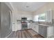 Modern kitchen with stainless steel appliances and granite countertops at 179 Andada Dr, Henderson, NV 89012