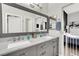 Elegant bathroom with double vanity and marble countertop at 22 Arborfield Ct, Henderson, NV 89012