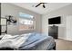 Cozy bedroom with large window and dresser at 22 Arborfield Ct, Henderson, NV 89012