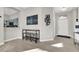 Light and airy entryway with wood-look floors and modern decor at 22 Arborfield Ct, Henderson, NV 89012