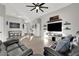 Sunlit living area with hardwood floors and modern decor at 22 Arborfield Ct, Henderson, NV 89012