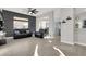 Bright living room, hardwood floors, view into kitchen at 22 Arborfield Ct, Henderson, NV 89012