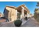 Covered patio with grill and seating area at 22 Arborfield Ct, Henderson, NV 89012