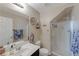 Small bathroom with shower, vanity, and mirror at 2404 Briggsdale Ave, North Las Vegas, NV 89081