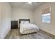 Comfortable bedroom with dresser and wood-look flooring at 2576 Desante Dr, Henderson, NV 89044