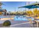 Relaxing community pool with ample seating and shade at 2576 Desante Dr, Henderson, NV 89044