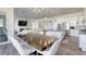 Elegant dining area with large wooden table at 2576 Desante Dr, Henderson, NV 89044