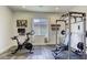 Home gym with exercise bike and weightlifting equipment at 2576 Desante Dr, Henderson, NV 89044