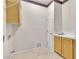 Laundry room with cabinets, sink, and overhead storage at 2617 Huber Heights Dr, Las Vegas, NV 89128