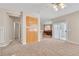 Spacious living room with a view of the dining area and patio at 2617 Huber Heights Dr, Las Vegas, NV 89128