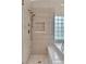 Spacious shower with built-in shelving and glass enclosure at 2617 Huber Heights Dr, Las Vegas, NV 89128