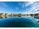 Scenic view of the lagoon with waterfront houses reflecting on the calm water at 2617 Huber Heights Dr, Las Vegas, NV 89128