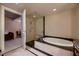 Bathroom with large walk in shower and separate tub at 2700 Las Vegas Blvd # 2006, Las Vegas, NV 89109