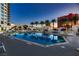 Relaxing resort-style pool with palm trees and lounge chairs at 2700 Las Vegas Blvd # 2006, Las Vegas, NV 89109