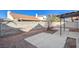 Small backyard with gravel, concrete patio, and a pergola at 321 Carrington St, Henderson, NV 89074