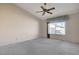 Bright bedroom with ceiling fan and window coverings at 321 Carrington St, Henderson, NV 89074