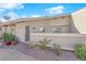 Backyard view featuring a patio, gravel pathway and desert landscaping at 3236 Mystic Ridge Ct, Las Vegas, NV 89129