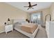 Spacious bedroom with plush bed and patio access at 3236 Mystic Ridge Ct, Las Vegas, NV 89129