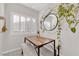 Small dining area with a wooden table and bench seating at 3236 Mystic Ridge Ct, Las Vegas, NV 89129