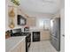 Modern kitchen with stainless steel appliances and ample counter space at 3236 Mystic Ridge Ct, Las Vegas, NV 89129