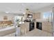 Kitchen with stainless steel appliances and light wood cabinets at 3236 Mystic Ridge Ct, Las Vegas, NV 89129