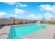 Community pool with mountain views and ample deck space at 3236 Mystic Ridge Ct, Las Vegas, NV 89129