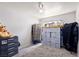 Cozy bedroom with a closet and storage unit at 3327 Outlook Point St, North Las Vegas, NV 89032