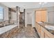 Elegant bathroom with marble flooring and a soaking tub at 360 E Desert Inn Rd # 1201, Las Vegas, NV 89109