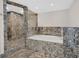 Luxurious bathroom with marble shower and soaking tub at 360 E Desert Inn Rd # 1201, Las Vegas, NV 89109